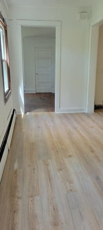 1 Barber Ave, Greenfield, MA 01301 - corridor with light wood-style flooring and baseboard heating