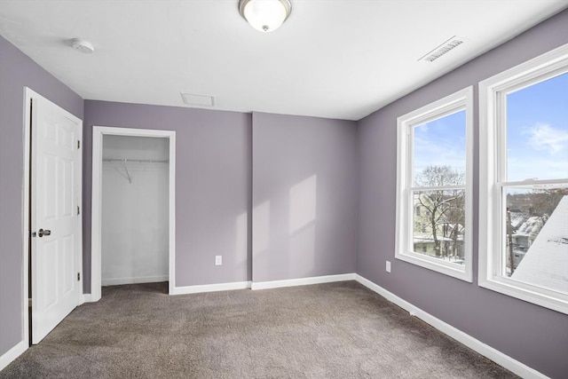 unfurnished bedroom with carpet