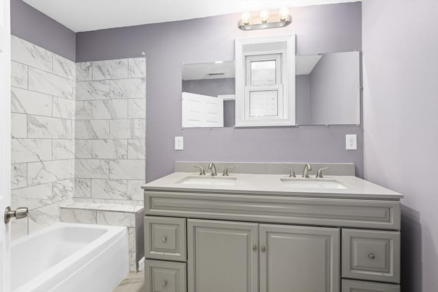 bathroom featuring vanity and shower / washtub combination