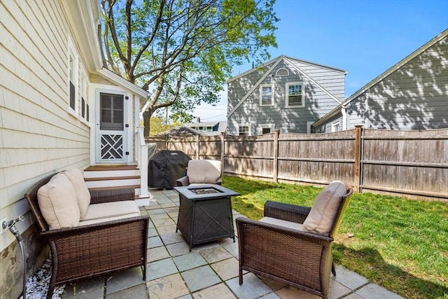 view of patio / terrace featuring a grill, an outdoor fire pit, and fence