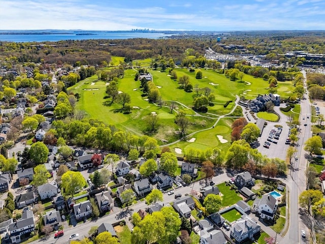 aerial view featuring a water view, golf course view, and a residential view