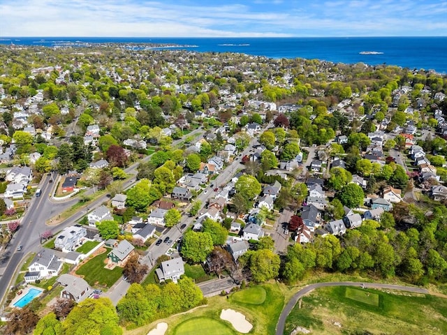 birds eye view of property with a water view and a residential view