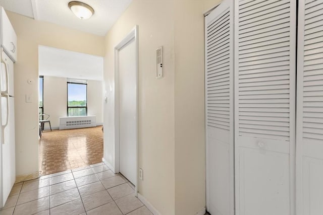 44 Washington St Unit 1208, Brookline, MA 02445 - hall with light tile patterned floors
