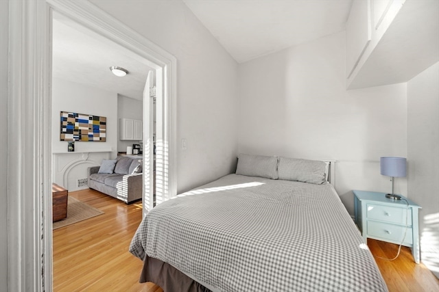 bedroom featuring light wood-type flooring