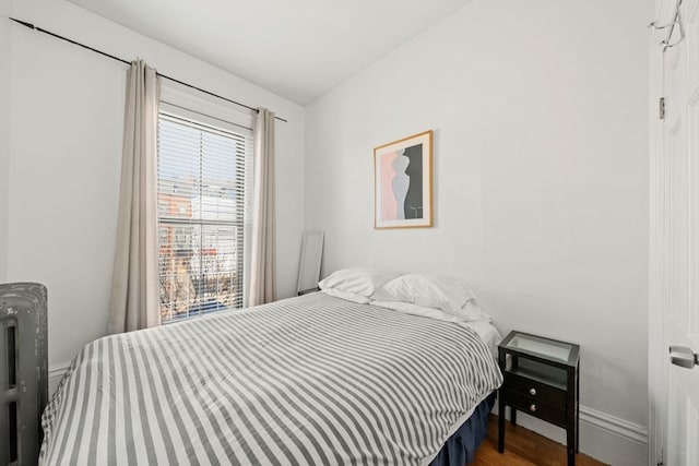 bedroom featuring hardwood / wood-style flooring