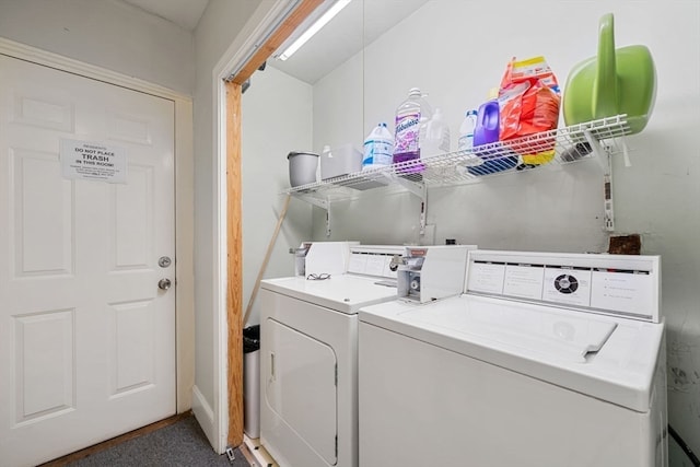 washroom with washer and dryer