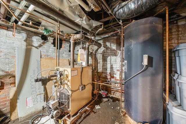 utility room featuring water heater