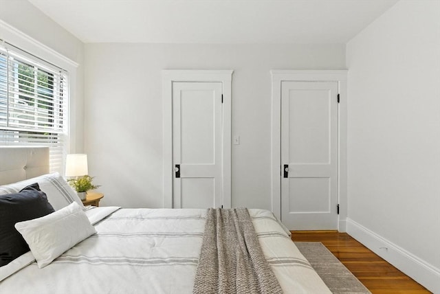 88 Brush Hill Rd, Milton, MA 02186 - bedroom featuring wood finished floors and baseboards