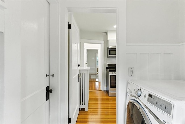 88 Brush Hill Rd, Milton, MA 02186 - laundry room with light wood-style flooring and recessed lighting