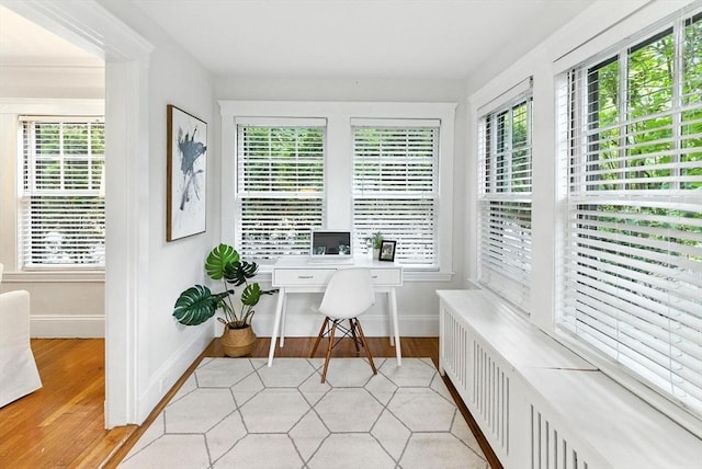 88 Brush Hill Rd, Milton, MA 02186 - home office with plenty of natural light and light wood-style floors