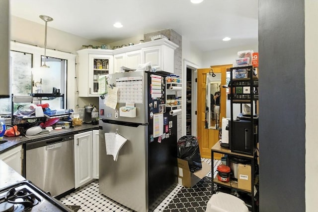 88 Brush Hill Rd, Milton, MA 02186 - kitchen with appliances with stainless steel finishes, white cabinetry, dark countertops, pendant lighting, and glass insert cabinets