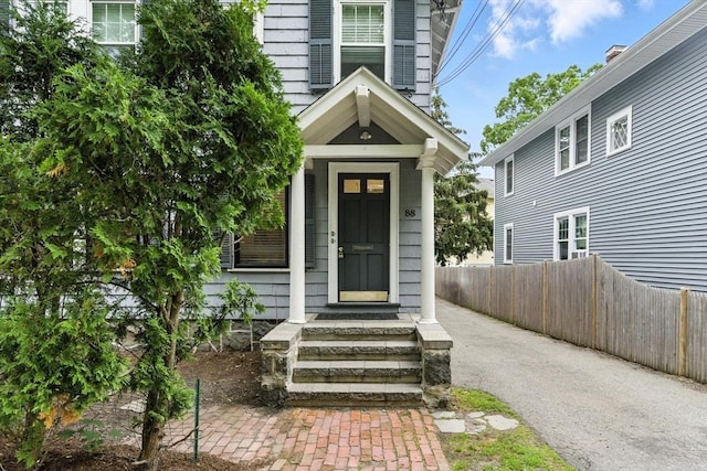 88 Brush Hill Rd, Milton, MA 02186 - view of exterior entry with asphalt driveway