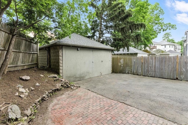 88 Brush Hill Rd, Milton, MA 02186 - fenced backyard with a patio and an outdoor structure