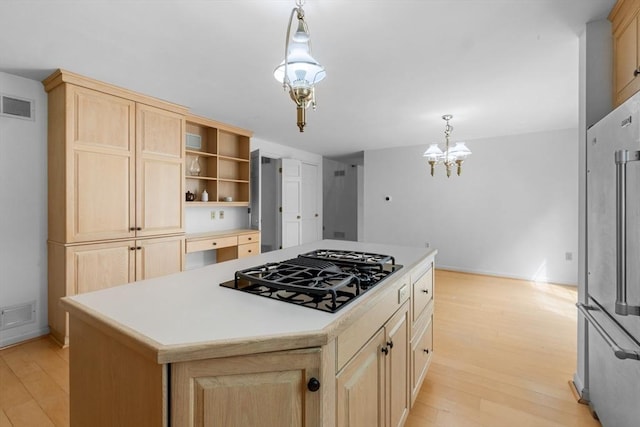 9 William Bradford Rd, Dartmouth, MA 02747 - kitchen featuring black gas cooktop, light brown cabinets, light wood-type flooring, high end refrigerator, and light countertops