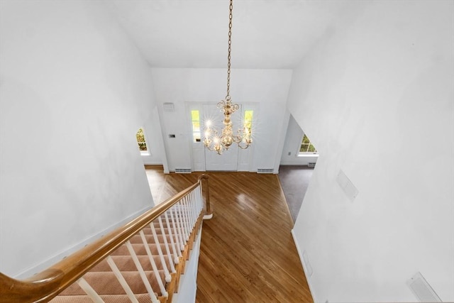 9 William Bradford Rd, Dartmouth, MA 02747 - entrance foyer featuring a chandelier, wood finished floors, and a high ceiling