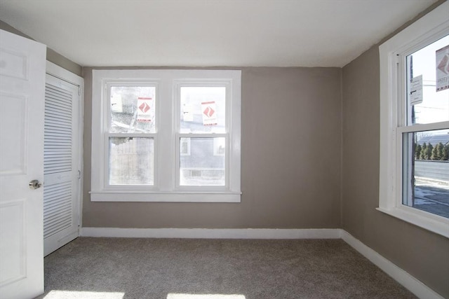 view of carpeted spare room