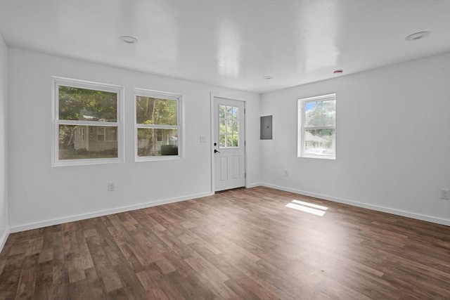 foyer with dark hardwood / wood-style floors and electric panel