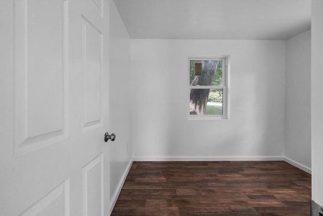 empty room featuring dark hardwood / wood-style floors