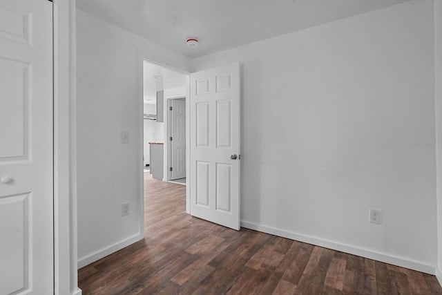 interior space with dark hardwood / wood-style floors