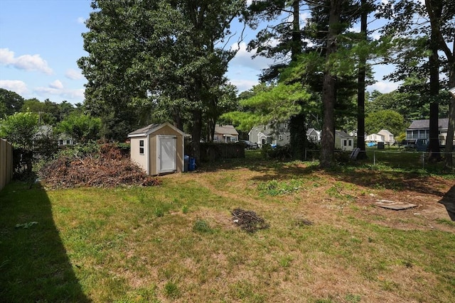 view of yard featuring a storage shed