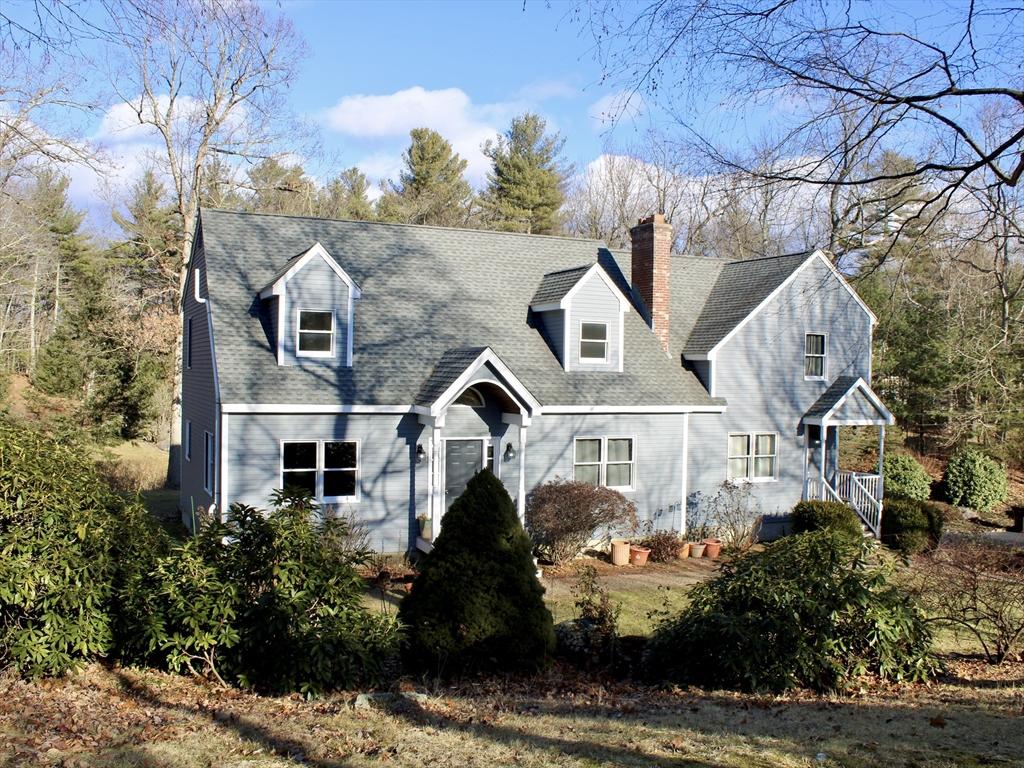 view of new england style home