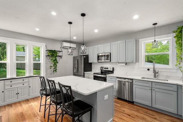 23 Schoolhouse Rd, Templeton, MA 01468 - kitchen with stainless steel appliances, gray cabinetry, a sink, healthy amount of natural light, and recessed lighting