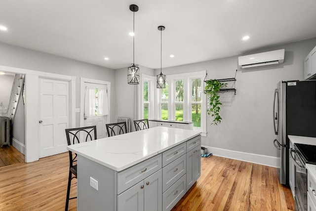 23 Schoolhouse Rd, Templeton, MA 01468 - kitchen featuring a wall mounted AC, a breakfast bar area, range with electric cooktop, baseboards, and recessed lighting