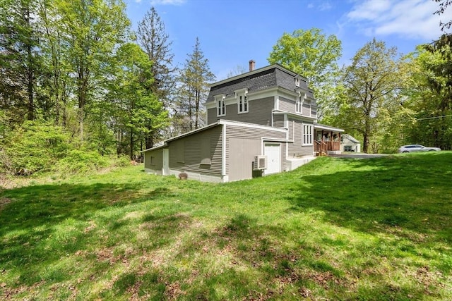 23 Schoolhouse Rd, Templeton, MA 01468 - back of house featuring a lawn and mansard roof