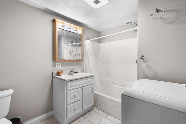 full bathroom featuring washer / clothes dryer, shower / bath combination with curtain, tile patterned flooring, baseboards, and toilet