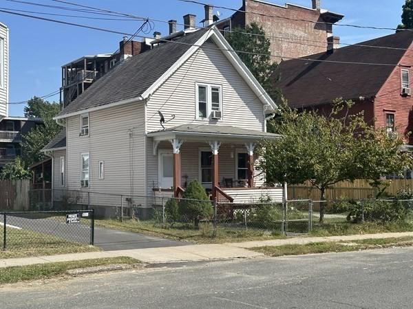 44 James St, Holyoke, MA 01040 - view of front of property with a porch and a fenced front yard