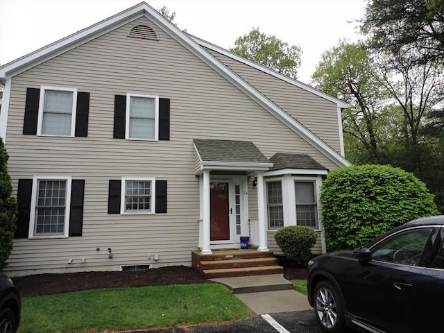 view of front of house with roof with shingles
