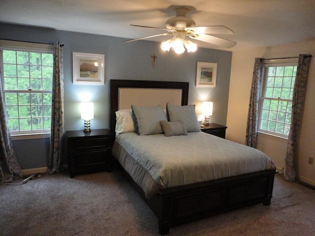 bedroom featuring carpet flooring, baseboards, and a ceiling fan