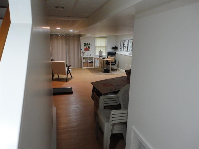 living room featuring wood finished floors and an office area