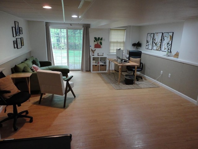 office area featuring wood finished floors, plenty of natural light, recessed lighting, and baseboards