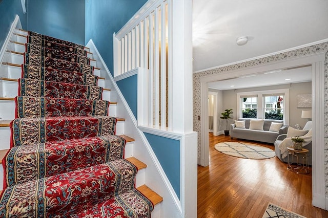 35 Warren Ave, Reading, MA 01867 - staircase with wood finished floors, crown molding, and baseboards