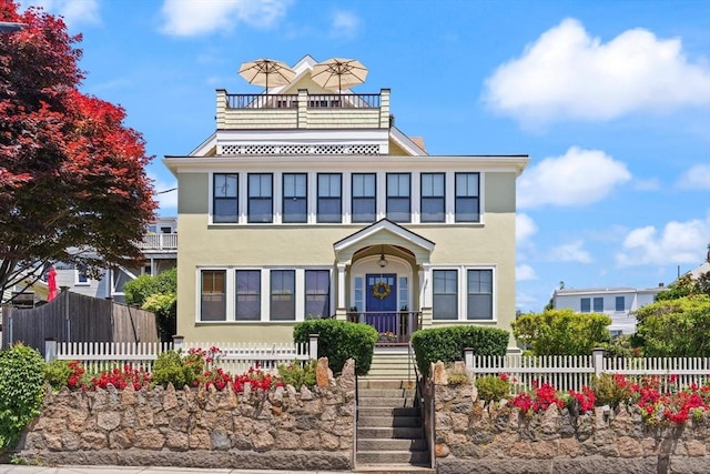 150 Prospect St Unit 3, Gloucester, MA 01930 - view of front of home featuring stucco siding and a balcony