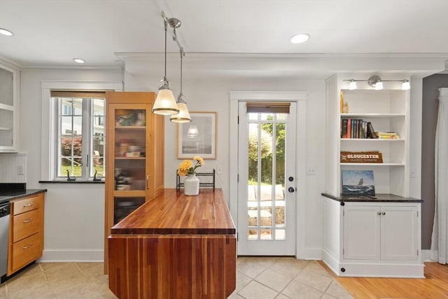 150 Prospect St Unit 3, Gloucester, MA 01930 - kitchen featuring crown molding, wooden counters, dishwasher, pendant lighting, and light tile patterned floors
