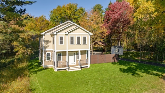 view of outbuilding featuring a yard and a porch