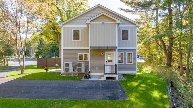 view of front of property with a front lawn
