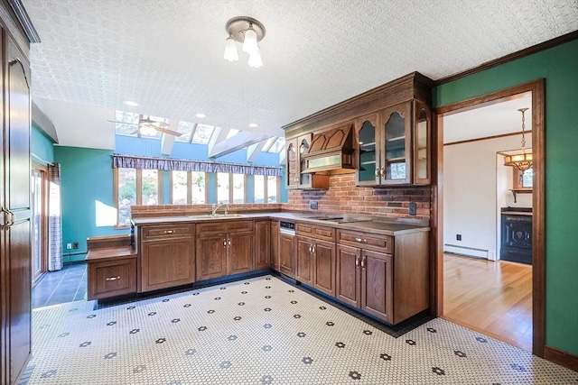 kitchen with sink, baseboard heating, black electric cooktop, custom range hood, and ornamental molding