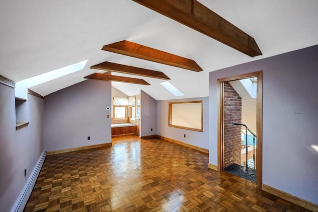 additional living space with dark parquet flooring, lofted ceiling with skylight, and a baseboard heating unit