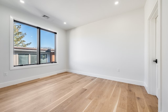 empty room featuring light hardwood / wood-style floors