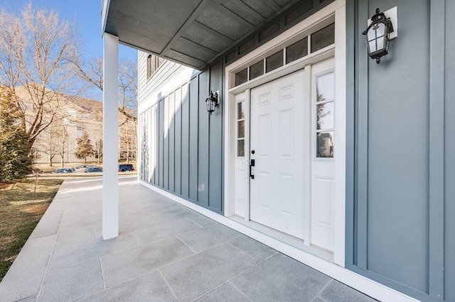 view of exterior entry with a mountain view