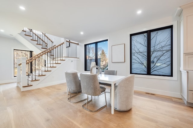 dining room with light hardwood / wood-style floors