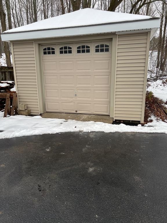 view of snow covered garage