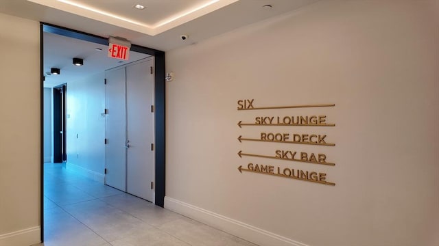 191 Washington St Unit 309, Boston, MA 02135 - hallway featuring light tile patterned floors and baseboards