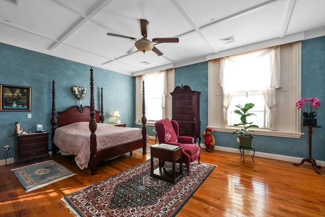 bedroom with ceiling fan, wood-type flooring, and coffered ceiling