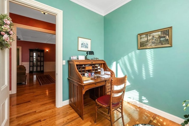 office space featuring light hardwood / wood-style flooring and ornamental molding