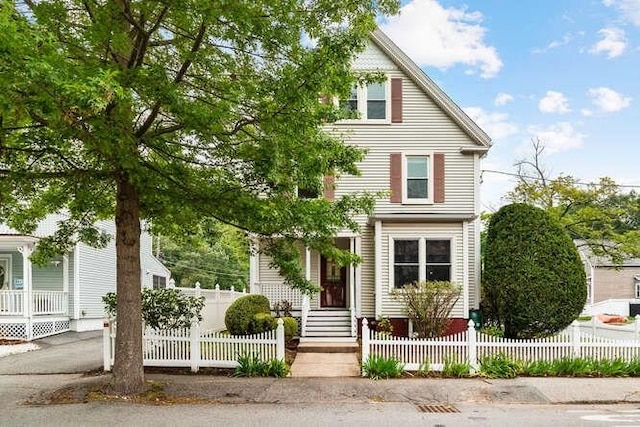 6 Francis Ave, Wakefield, MA 01880 - view of front of home with a fenced front yard