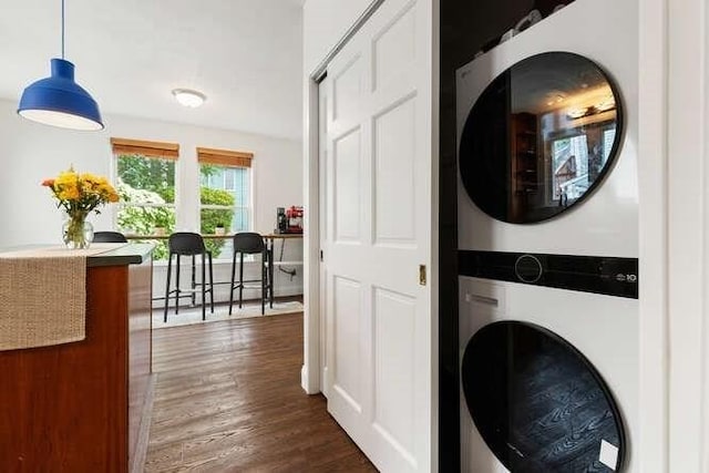 6 Francis Ave, Wakefield, MA 01880 - laundry room featuring estacked washer and dryer and dark wood-style floors